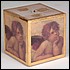 29551 Cupids cover every side of this candle edged in gold and lightly scented. 