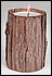29552 Surrounded by real wood bark, this pine scented candle has a rustic look. 