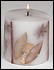 29554 Cinnamon sticks and leaves prevail in this Spice Island scented candle. 