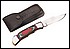 30022 An eye-catching, multi-hued handle is the focal point of this pocket knife with stainless steel blades and black leather sheath. 