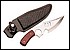 30041 A mahogany color handle enhances the rare shape and design of the stainless steel blade on this unusual knife.  With leather sheath. 