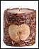 30093 Real dried apple slices are set into this cinnamon scented candle. 