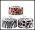 31126 A trio of candles swathed in animal prints, for those intrigued by the wilds of an African safari. 